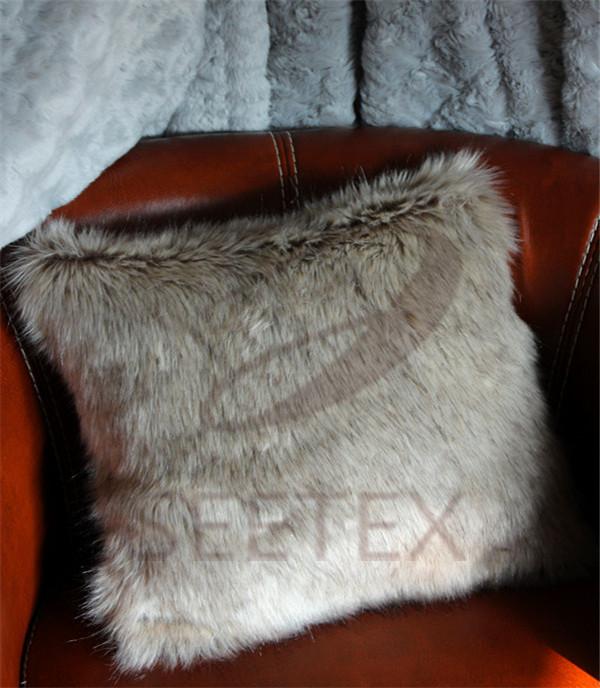 Gray wolf faux fur pillow