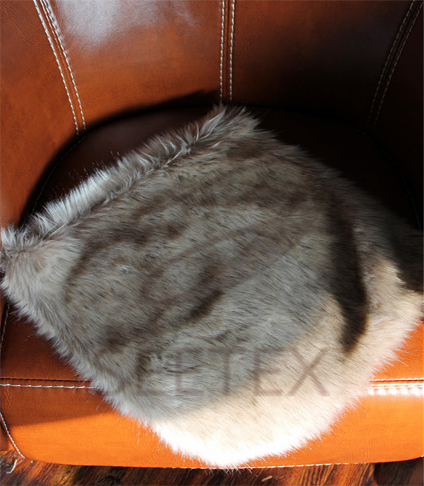 Gray wolf faux fur pillow