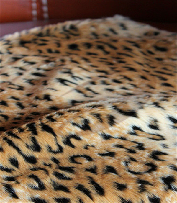 Textured leopard jacquard faux fur pillow