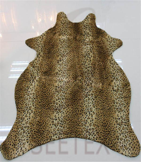 Textured leopard faux fur rug