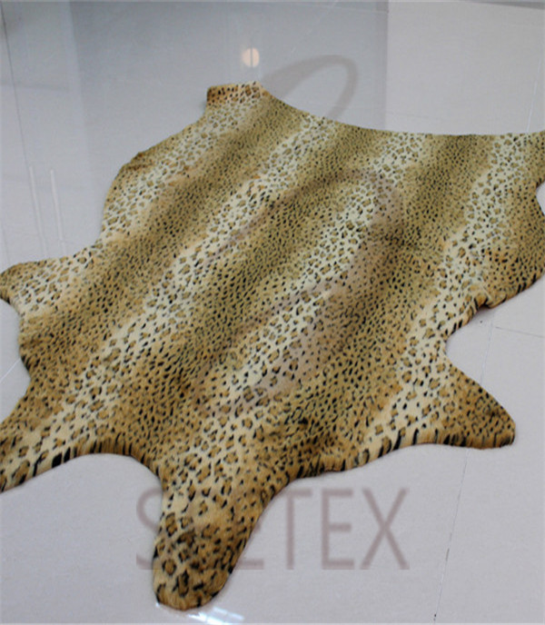 Textured leopard faux fur rug