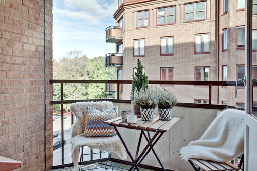 Toss fuzzy blankets over patio chairs